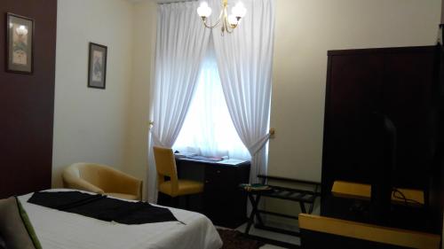 Imagen de la habitación del Hotel Royal Crown, Sharjah. Foto 7