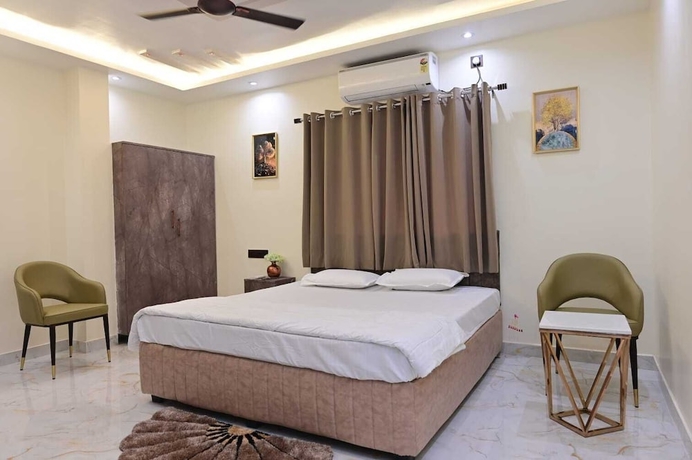 Imagen de la habitación del Hotel Royal Galaxy Homes. Foto 1