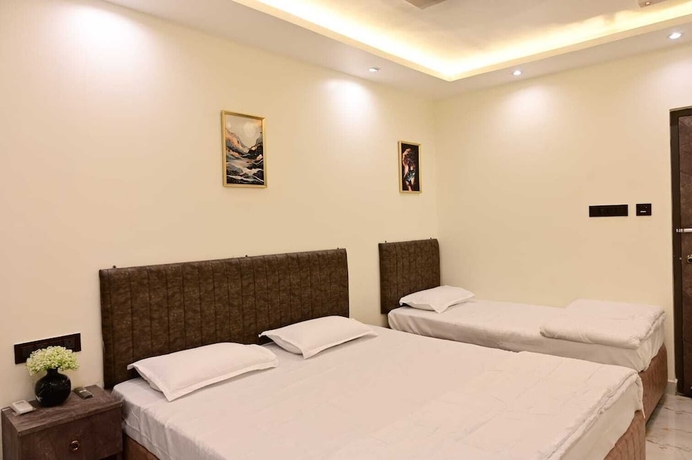 Imagen de la habitación del Hotel Royal Galaxy Homes. Foto 8
