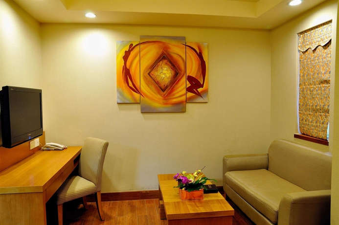 Imagen de los interiores del Hotel Royal Garden, Guangzhou. Foto 11