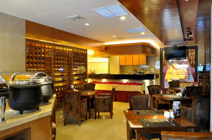 Imagen del bar/restaurante del Hotel Royal Garden, Guangzhou. Foto 1