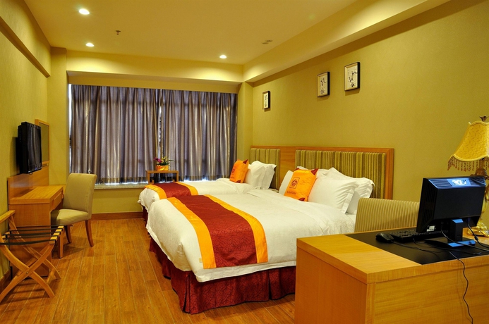 Imagen de la habitación del Hotel Royal Garden, Guangzhou. Foto 7