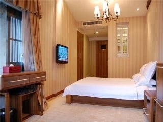 Imagen de la habitación del Hotel Royal Garden Inn. Foto 10