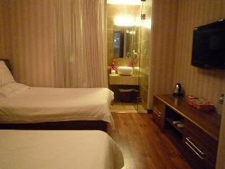 Imagen de la habitación del Hotel Royal Garden Inn. Foto 11