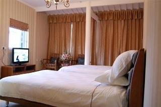 Imagen de la habitación del Hotel Royal Garden Inn. Foto 12