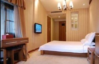 Imagen de la habitación del Hotel Royal Garden Inn. Foto 14