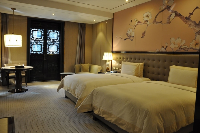 Imagen de la habitación del Hotel Royal Garden Shanghai. Foto 3