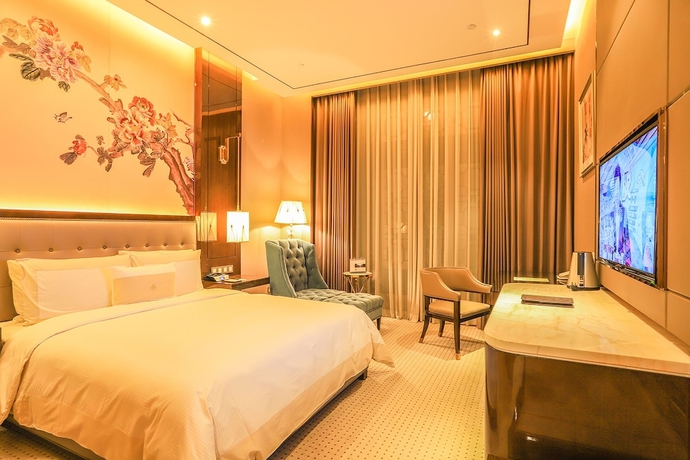 Imagen de la habitación del Hotel Royal Garden Shanghai. Foto 11