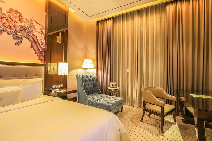 Imagen de la habitación del Hotel Royal Garden Shanghai. Foto 12