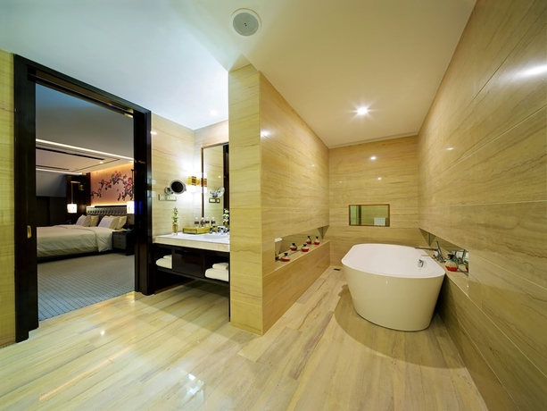 Imagen de la habitación del Hotel Royal Garden Shanghai. Foto 13