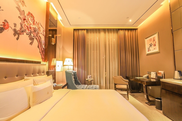 Imagen de la habitación del Hotel Royal Garden Shanghai. Foto 15