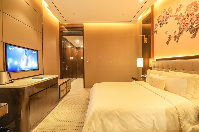 Imagen de la habitación del Hotel Royal Garden Shanghai. Foto 16