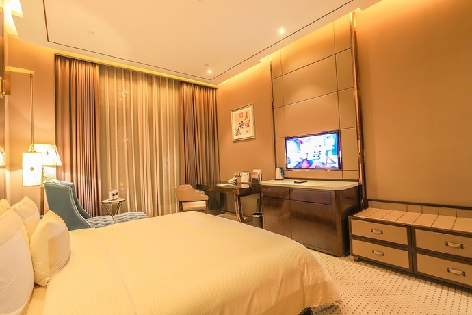 Imagen de la habitación del Hotel Royal Garden Shanghai. Foto 17