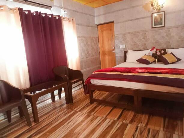 Imagen de la habitación del Hotel Royal Green Buds. Foto 19