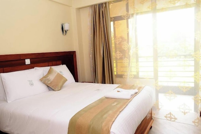 Imagen de la habitación del Hotel Royal Green Gardens. Foto 1