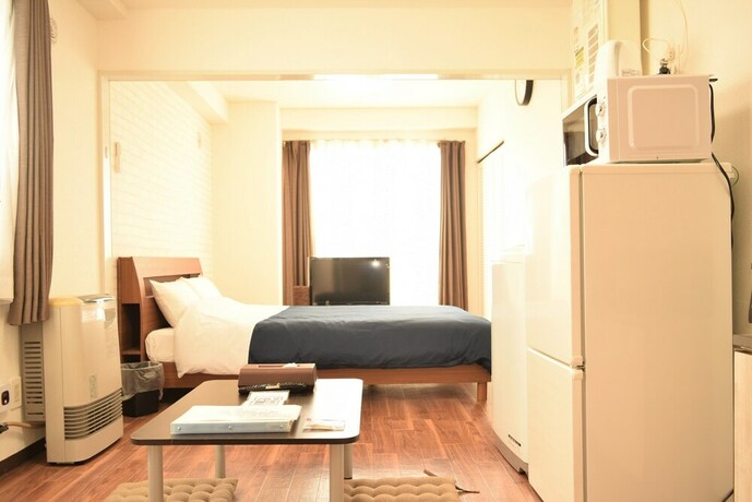 Imagen de la habitación del Hotel Royal Heights Kikusui Station. Foto 17