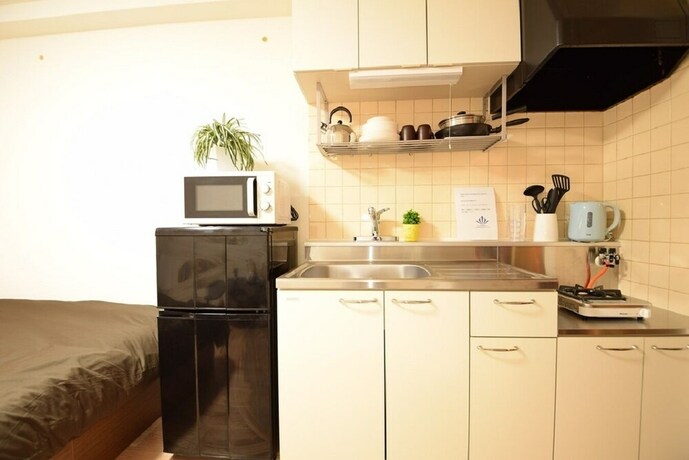 Imagen de la habitación del Hotel Royal Heights Kikusui Station. Foto 19