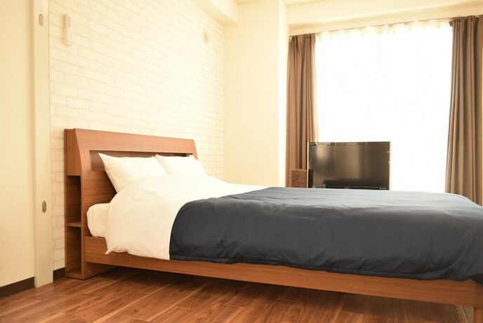 Imagen de la habitación del Hotel Royal Heights Kikusui Station. Foto 31