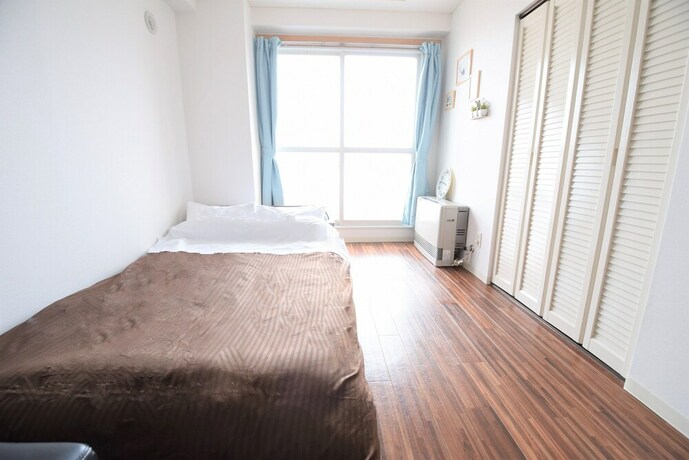 Imagen de la habitación del Hotel Royal Heights Kikusui Station. Foto 32
