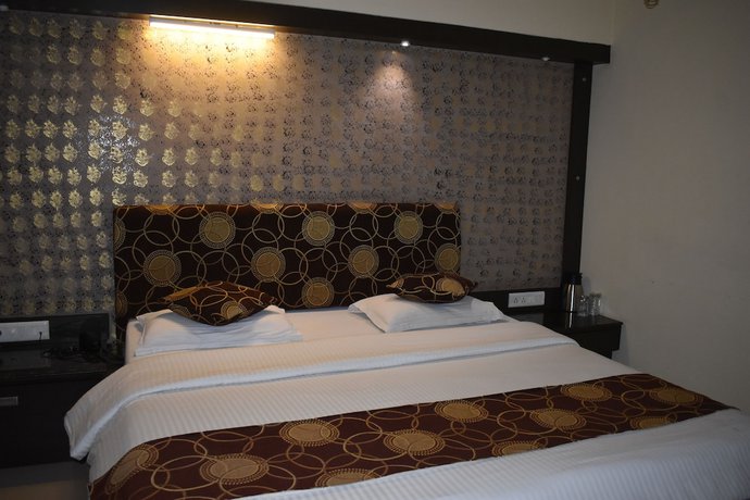 Imagen de la habitación del Hotel Royal Highness, Ahmedabad. Foto 11