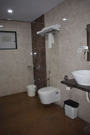 Imagen de la habitación del Hotel Royal Highness, Ahmedabad. Foto 12