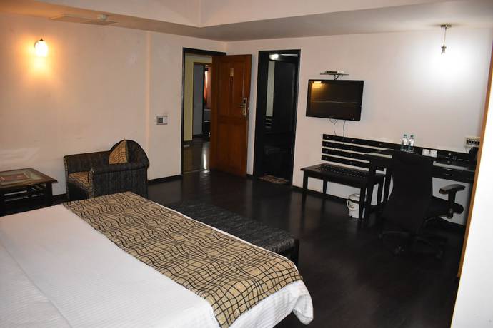 Imagen de la habitación del Hotel Royal Highness, Ahmedabad. Foto 15