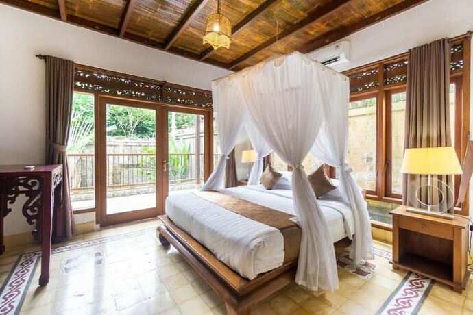 Imagen de la habitación del Hotel Royal Indah Bali Villas. Foto 15