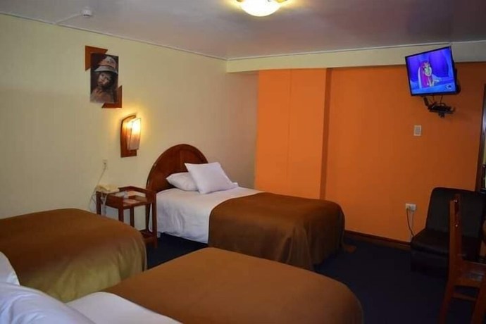 Imagen de la habitación del Hotel Royal Inn Juliaca. Foto 12