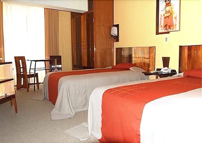 Imagen de la habitación del Hotel Royal Inn Puno. Foto 10