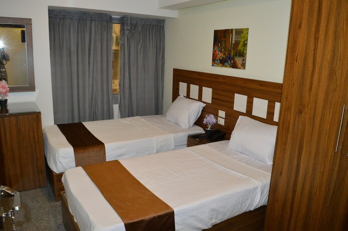 Imagen de la habitación del Hotel Royal Inn Residence. Foto 16