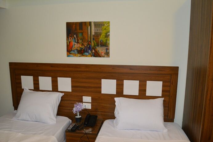 Imagen de la habitación del Hotel Royal Inn Residence. Foto 17