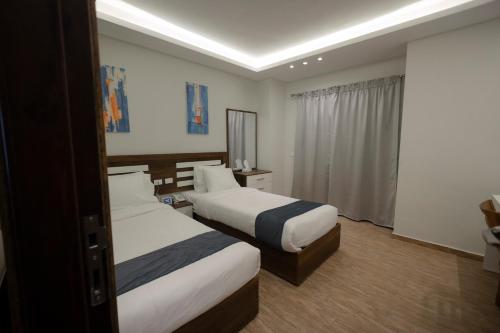Imagen de la habitación del Hotel Royal Inn Residence New Cairo. Foto 17