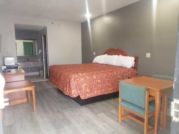 Imagen de la habitación del Hotel Royal Inn and Suite. Foto 13