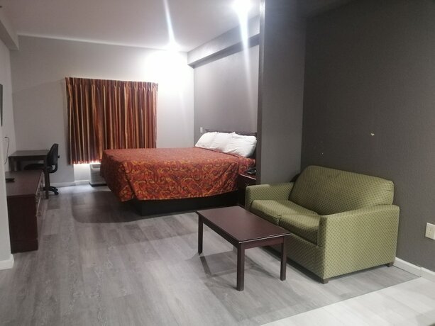 Imagen de la habitación del Hotel Royal Inn and Suite. Foto 16