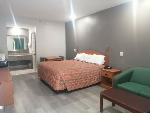 Imagen de la habitación del Hotel Royal Inn and Suite. Foto 18