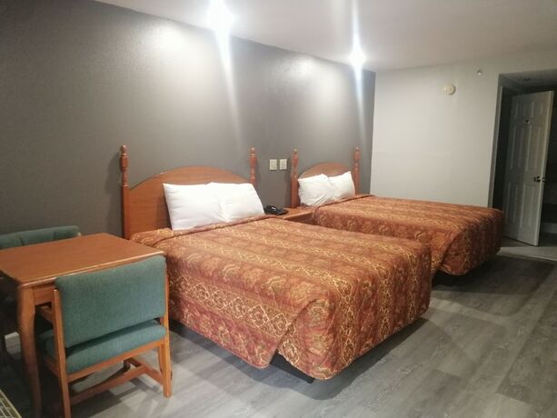 Imagen de la habitación del Hotel Royal Inn and Suite. Foto 20