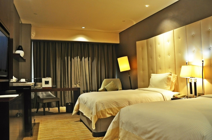 Imagen de la habitación del Hotel Royal International, Chuansha. Foto 9