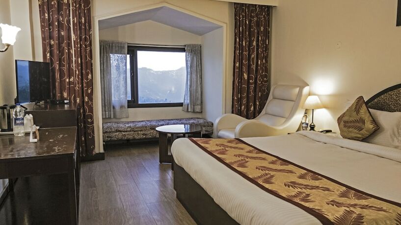 Imagen de la habitación del Hotel Royal Jardin Whistling Pines Resort. Foto 13