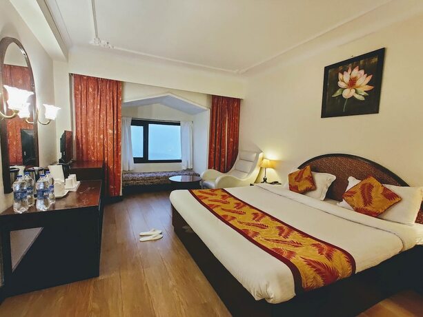 Imagen de la habitación del Hotel Royal Jardin Whistling Pines Resort. Foto 19
