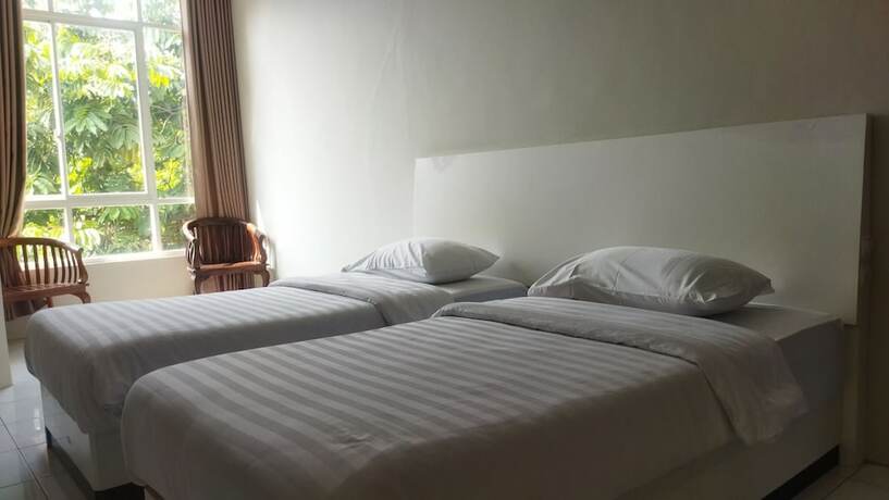 Imagen de la habitación del Hotel Royal Kencana powered by Cocotel. Foto 11