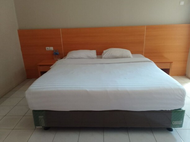 Imagen de la habitación del Hotel Royal Kencana powered by Cocotel. Foto 20