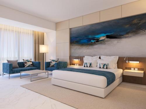 Imagen de la habitación del Hotel Royal M Al Aqah Beach Resort by Gewan. Foto 17