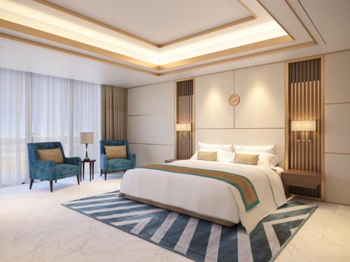 Imagen de la habitación del Hotel Royal M Al Aqah Beach Resort by Gewan. Foto 20