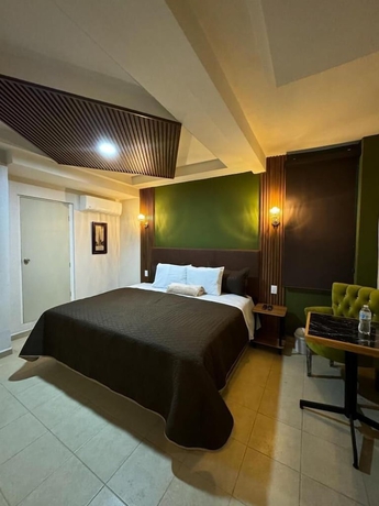 Imagen de la habitación del Hotel Royal Madero Inn Express. Foto 7