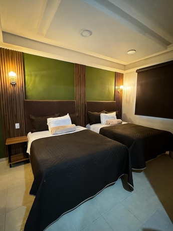 Imagen de la habitación del Hotel Royal Madero Inn Express. Foto 8