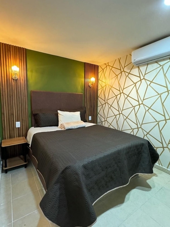 Imagen de la habitación del Hotel Royal Madero Inn Express. Foto 9