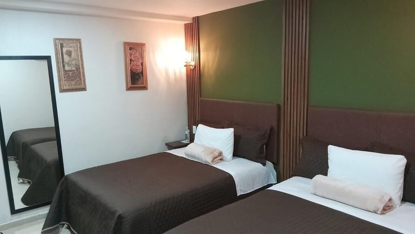 Imagen de la habitación del Hotel Royal Madero Inn Express. Foto 10