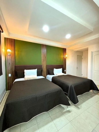 Imagen de la habitación del Hotel Royal Madero Inn Express. Foto 11