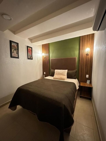 Imagen de la habitación del Hotel Royal Madero Inn Express. Foto 12