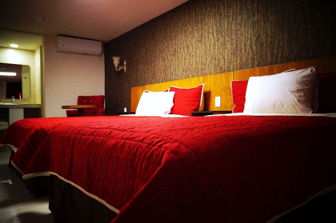 Imagen de la habitación del Hotel Royal Madero Inn. Foto 3
